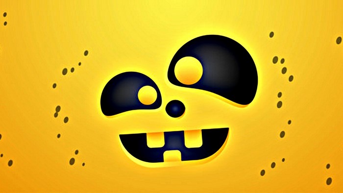 Halloween pumpkin face with black dots