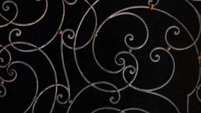 Metal texture with ornate scrollwork