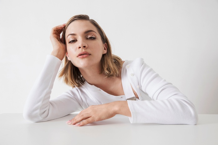 Tove Styrke posing with hand on head