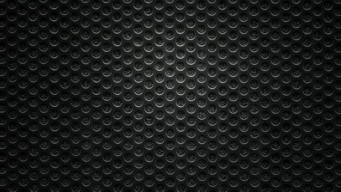 Dark perforated metal texture
