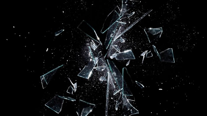 Shattered Glass Fragments Exploding