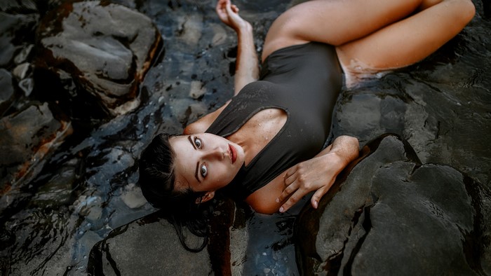 4K Girl in Swimsuit on Rocks