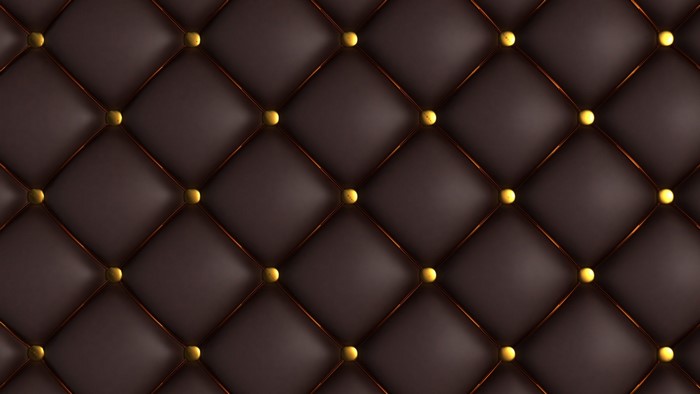 Brown Tufted Upholstery Texture with Gold Studs