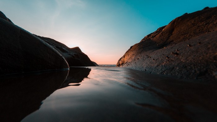 Rocks and water at sunset
