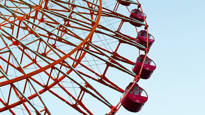 Ferris wheel with red cabins