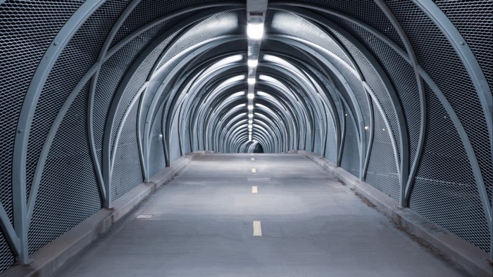 Modern tunnel with arched metal structure