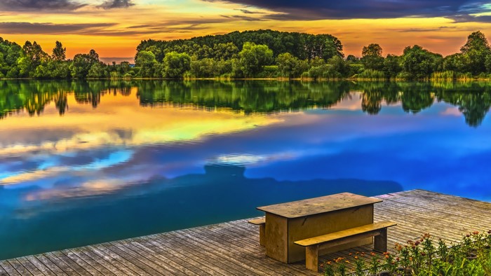 4K Landscape with lake and pier at sunset