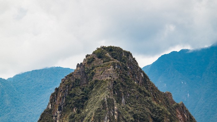 Machu Picchu mountain peak with ruins