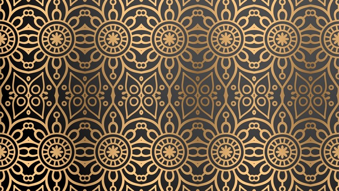 Golden mandala pattern on black background