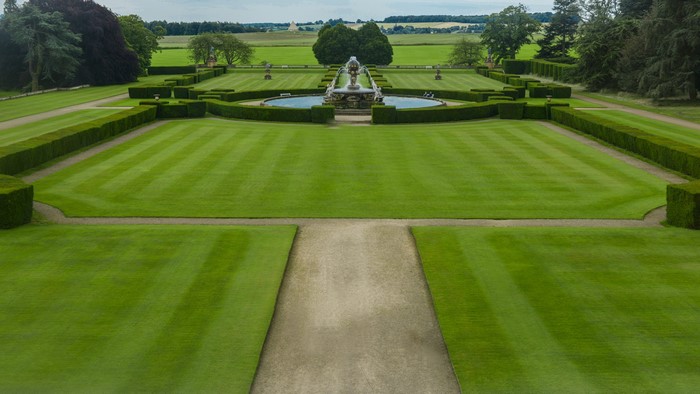 Formal garden with fountain and manicured lawns