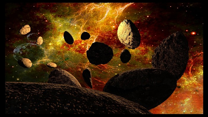 Asteroids in a colorful nebula