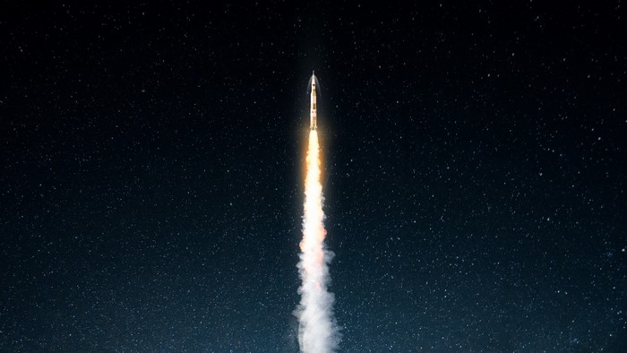 Rocket Launching into Starry Night Sky