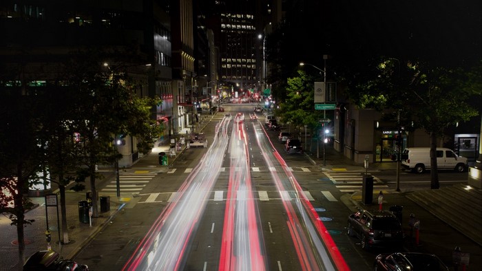 Night city street with light trails