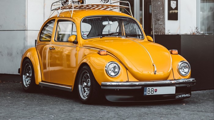 Yellow Volkswagen Beetle with Roof Rack