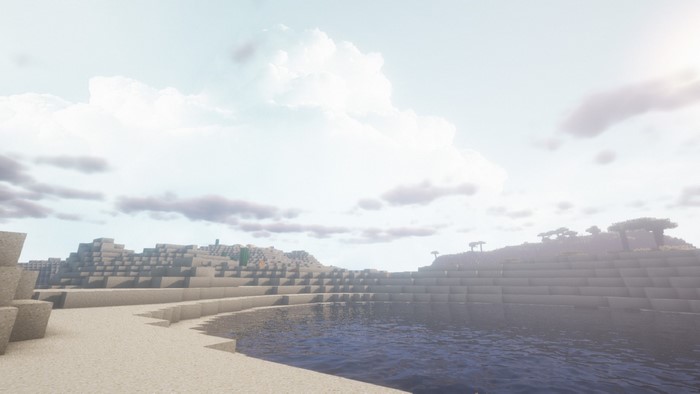 Minecraft landscape with water and sand dunes