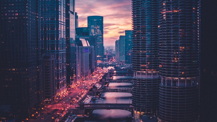 Chicago skyline at dusk with river and bridges