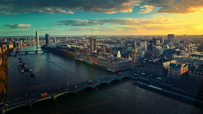 Aerial view of London with the Houses of Parliament and River Thames at sunset