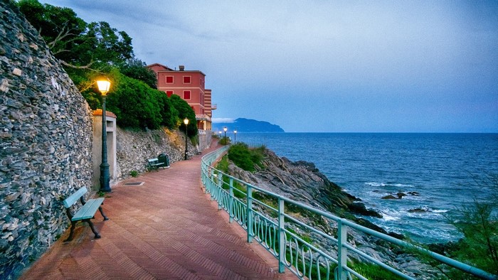 Coastal promenade with buildings and the sea