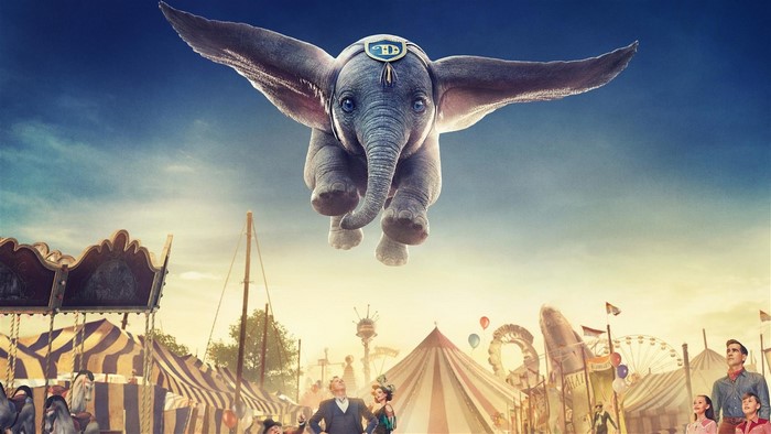 Dumbo flying over a circus