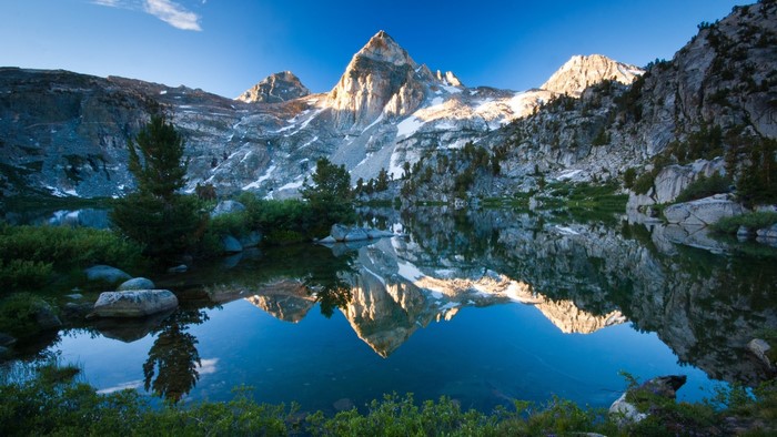 Mountain reflected in a lake at sunrise