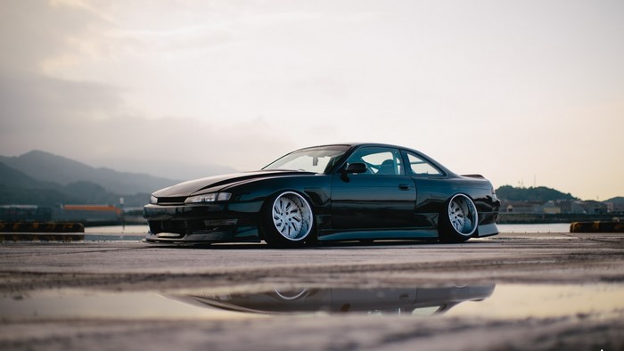 Black Nissan S14 with custom wheels