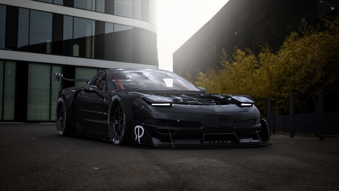 Black Chevrolet Corvette C5 with racing modifications