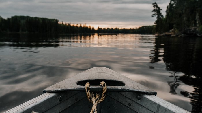 Boat on a lake at sunset