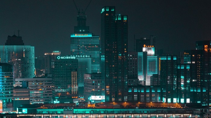 Night cityscape with illuminated skyscrapers
