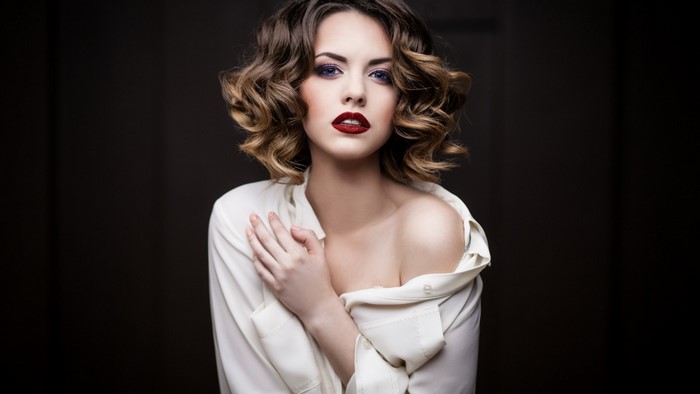Model posing with dark background