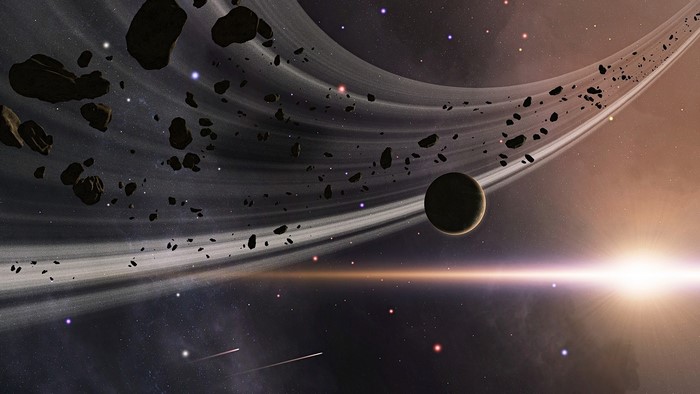 Asteroid belt with planet and bright star