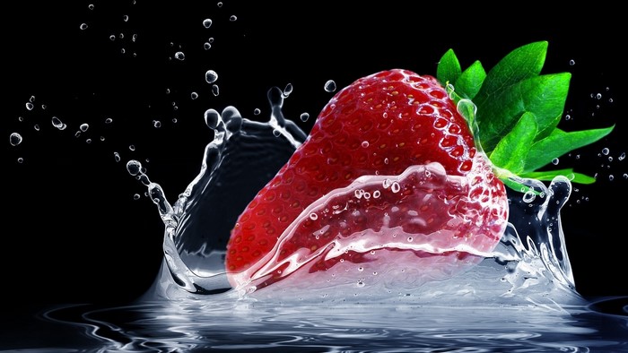 Strawberry splashing into water