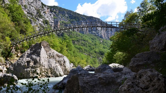 Suspension bridge over a river in a gorge