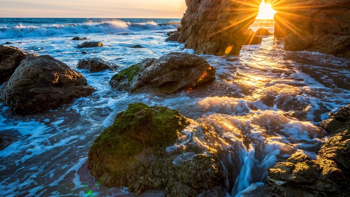4K Sunrise Over Rocky Ocean Shore
