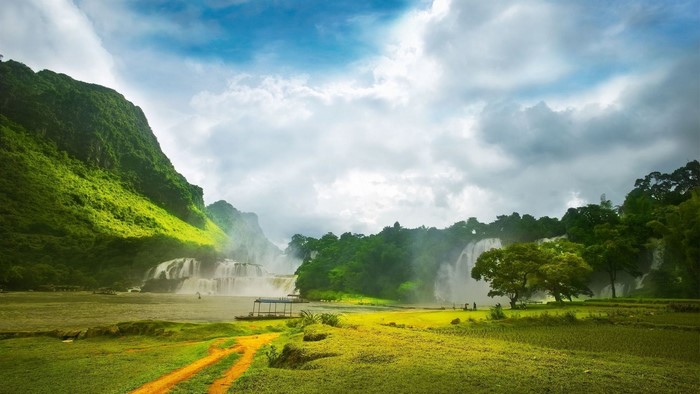 Couple of waterfalls in a green landscape
