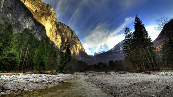 Mountain valley with river and forest