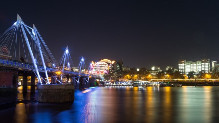 Golden Jubilee Bridge at night over River Thames, London