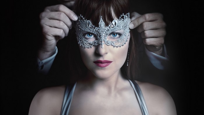 Dakota Johnson wearing a mask