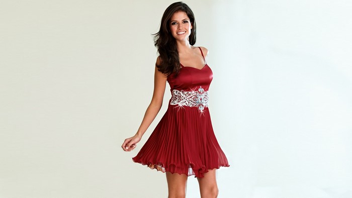 Carla Ossa in a red dress