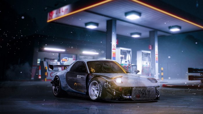 Modified car at a gas station at night