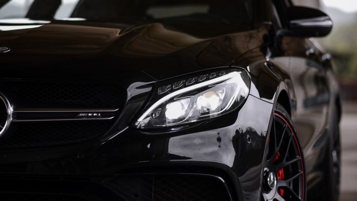 Black Mercedes-Benz C63s AMG car front detail