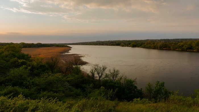 Russian landscape with river and trees