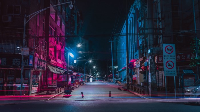 Night city street with neon lights