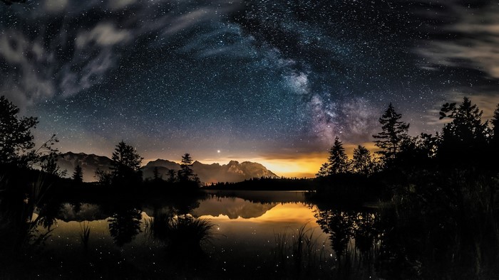 Milky Way over a lake and mountains