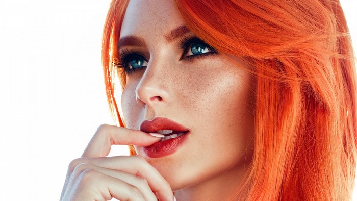 Woman with orange hair and freckles