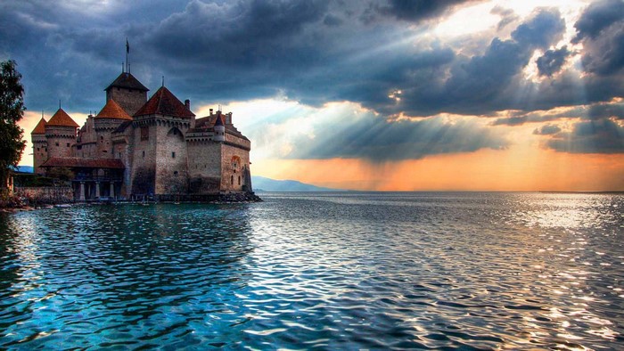 Chillon Castle on Lake Geneva at sunset