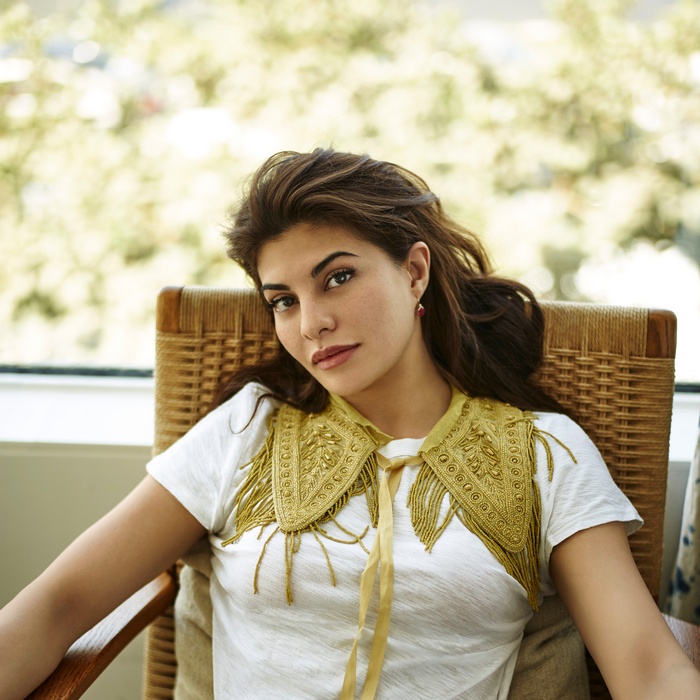 Jacqueline Fernandez sitting in a chair