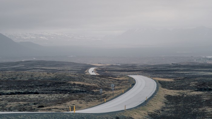 Curving road through a desolate landscape