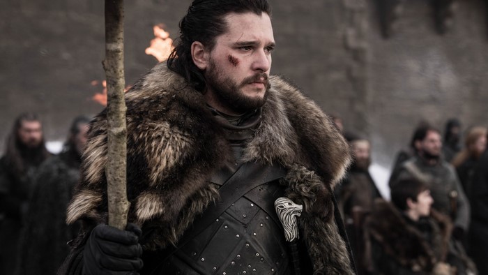 Jon Snow from Game of Thrones holding a torch