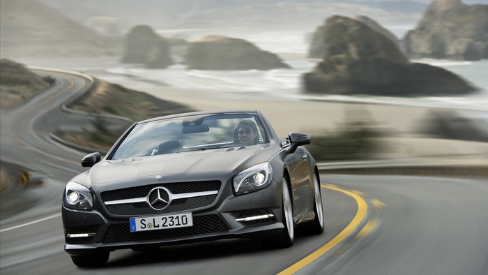 Mercedes-Benz SL Convertible Driving on Coastal Road