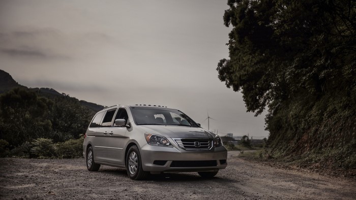 Honda Odyssey minivan on a dirt road